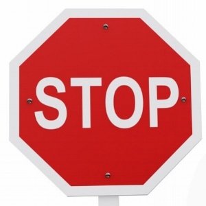 3D guy with a stop sign - isolated over a white background-774439-edited.jpeg