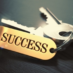 Keys to Success - Concept on Golden Keychain over Black Wooden Background. Closeup View, Selective Focus, 3D Render. Toned Image.-352393-edited.jpeg
